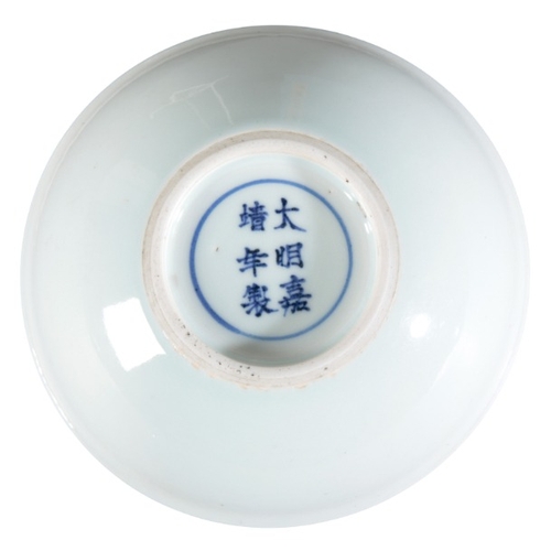 220 - A CHINESE PORCELAIN BLUE AND WHITE BOWL

bearing a six character Jiajing mark to the base, decorated... 