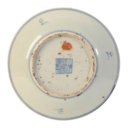 231 - A CHINESE PORCELAIN BLUE AND WHITE DISH

bearing a six character seal mark to the base, Qing dynasty... 