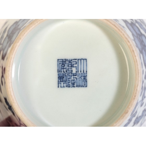 232 - A CHINESE PORCELAIN BLUE AND WHITE MEIPING VASE

bearing a six character Qianlong seal mark to the b... 