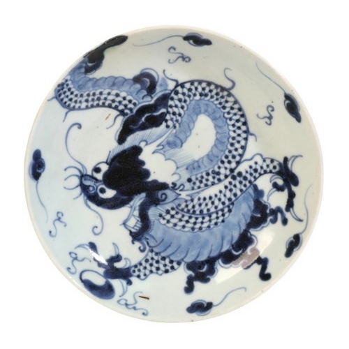 235 - A CHINESE PORCELAIN BLUE AND WHITE 'DRAGON' DISH

bearing a two character mark to the base, decorate... 