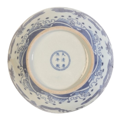 243 - A CHINESE PORCELAIN BLUE AND WHITE BOWL

bearing a six character Kangxi mark to the base, 20th centu... 