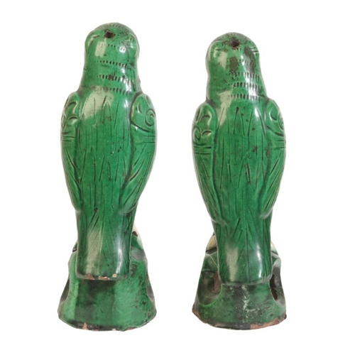 284 - A PAIR OF CHINESE SANCAI GLAZED PARROTS

19th century, both perched on naturalistic pierced bases, 2... 