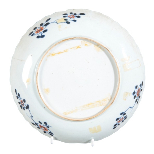 287 - A CHINESE PORCELAIN 'TABACCO LEAF' PLATE

Qing dynasty, with shaped rim, 22cm diameter