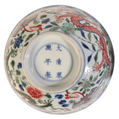 320 - A CHINESE PORCELAIN WUCAI BOWL

bearing a six character Kangxi mark to the base, Qing dynasty, decor... 