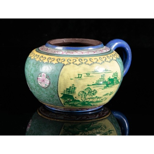 333 - A CHINESE YIXING TEAPOT

late 19th century/early 20th century, painted in polychrome with mountainou... 