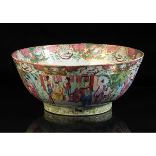 372 - A CHINESE PORCELAIN FAMILLE ROSE PUNCH BOWL

18th/19th century, the interior decorated with panels o... 