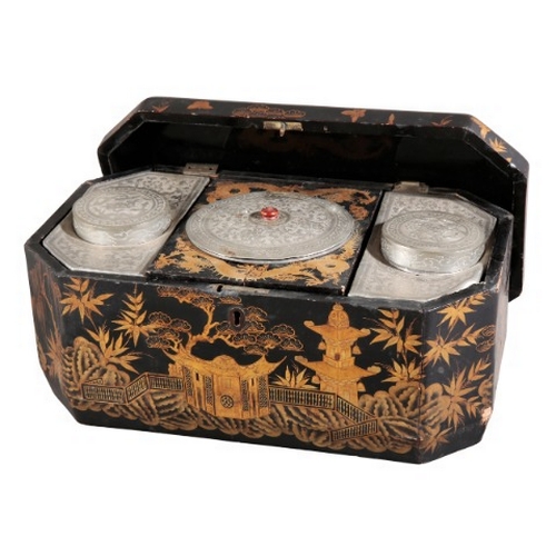 420 - A CHINESE EXPORT BLACK LACQUER TEA CADDY

19th/20th century, decorated throughout with pagodas in an... 