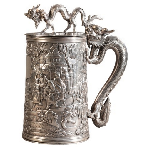 423 - A CHINESE EXPORT SILVER TANKARD BY LEECHING

marked to the base, the tapered cylindrical body with a... 