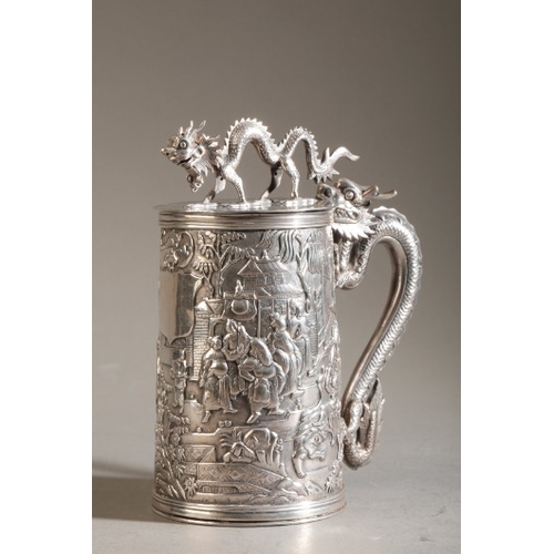 423 - A CHINESE EXPORT SILVER TANKARD BY LEECHING

marked to the base, the tapered cylindrical body with a... 