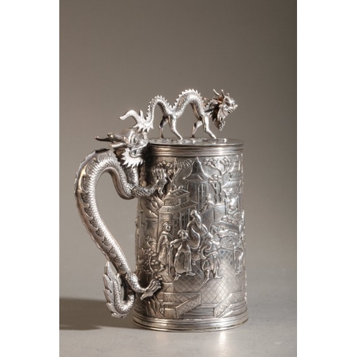 423 - A CHINESE EXPORT SILVER TANKARD BY LEECHING

marked to the base, the tapered cylindrical body with a... 