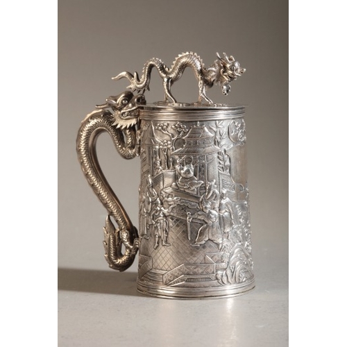 423 - A CHINESE EXPORT SILVER TANKARD BY LEECHING

marked to the base, the tapered cylindrical body with a... 