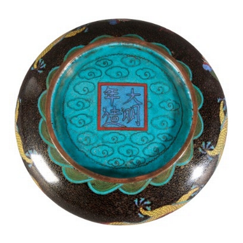 429 - A CHINESE CLOISONNE BOWL

bearing a four character mark to the base, 20th century, decorated with dr... 