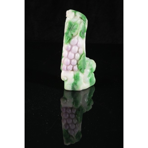 459 - A CHINESE CARVED JADE 'SQUIRREL AND GRAPES' MOUNTAIN

probably Qing dynasty, of naturalistic form, t... 