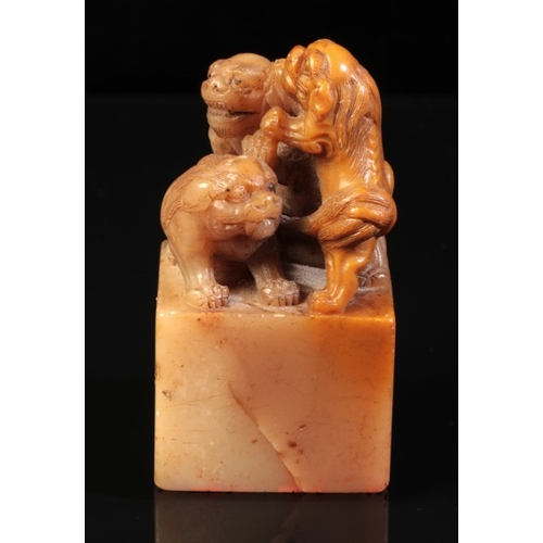 463 - A CHINESE SOAPSTONE 'MYTHICAL BEASTS' SEAL

attributable to Yang Yuxuan, Qing dynasty, the three bea... 