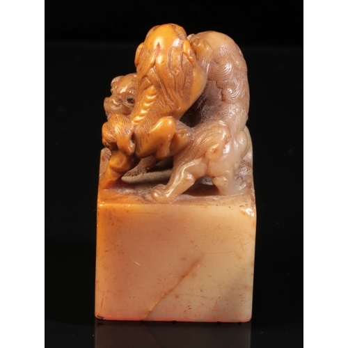 463 - A CHINESE SOAPSTONE 'MYTHICAL BEASTS' SEAL

attributable to Yang Yuxuan, Qing dynasty, the three bea... 