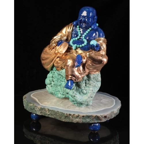 480 - LUIS ALBERTO QUISPE APARICIO (20TH CENTURY) A LAPIS LAZULI FIGURE OF BUDDHA

modelled seated on a tu... 