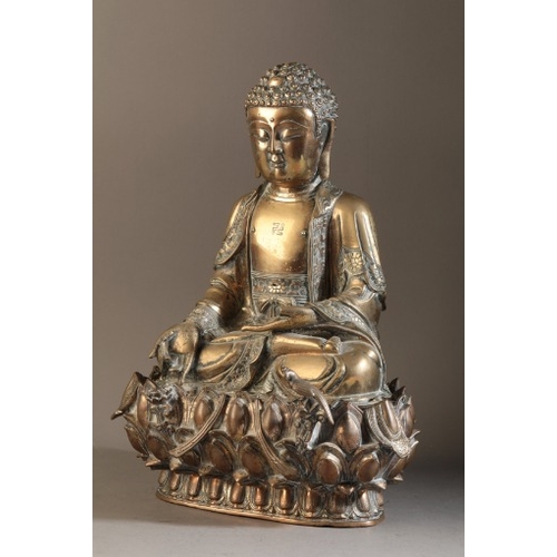 481 - A GILT BRONZE FIGURE OF BUDDHA

Ming dynasty, figured seated in dhyanasana, the right hand extended ... 