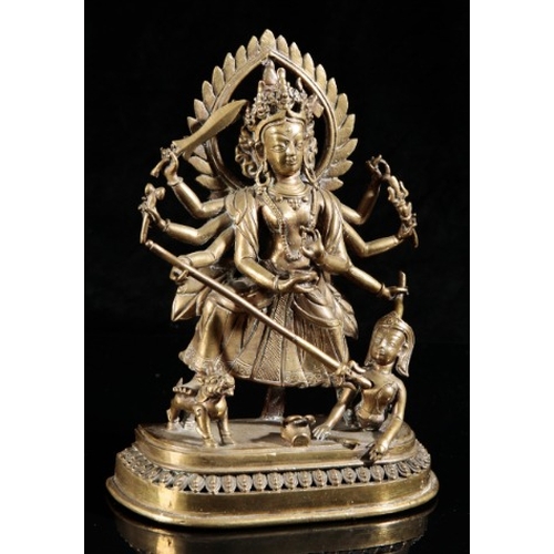 487 - A NEPALESE GILT BRONZE FIGURE OF DURGA

Qing dynasty, cast standing on a lotus base holding various ... 