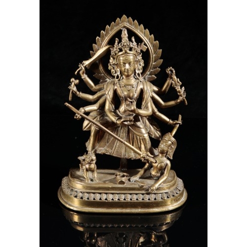 487 - A NEPALESE GILT BRONZE FIGURE OF DURGA

Qing dynasty, cast standing on a lotus base holding various ... 