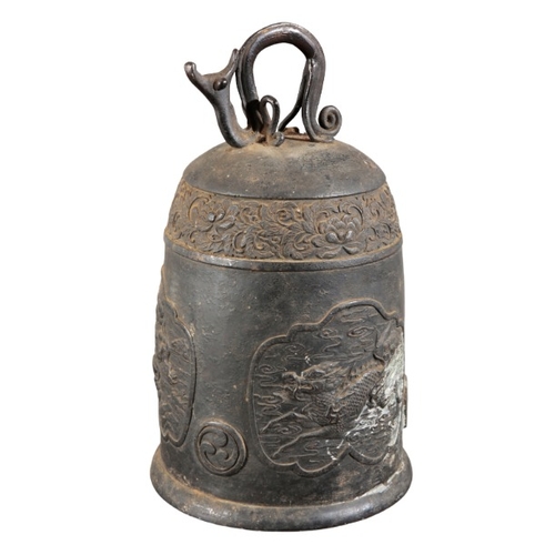 500 - A SOUTH EAST ASIAN BRONZE TEMPLE BELL

20th century, with a stylized animal ring loop, decorated wit... 