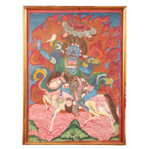 532 - TIBETAN SCHOOL, 19TH CENTURY Panjarnata Mahakala

painted on panel, against a background of flames, ... 