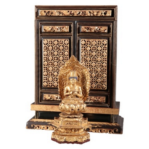 547 - A CHINESE BLACK LACQUER AND PARCEL GILT SHRINE CABINET

19th/20th century, with pierced and foliate ... 