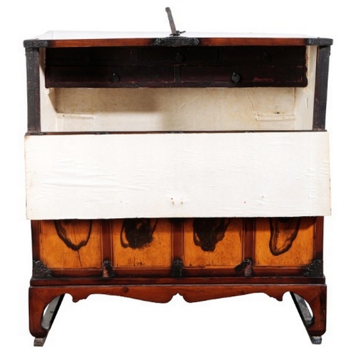 554 - A KOREAN CHEST ON STAND

20th century, the fall front opening to an interior fitted with five short ... 