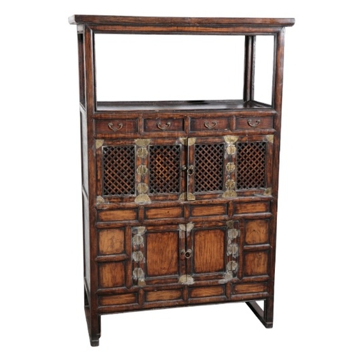 556 - A KOREAN ELM TALL CABINET

20th century, with an open shelf over an arrangement of four short drawer... 