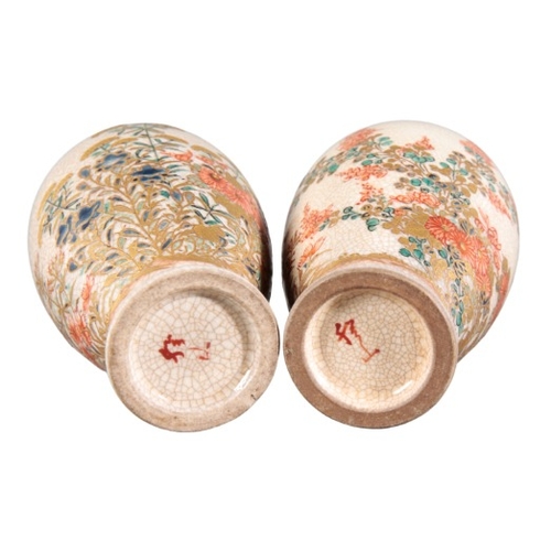 563 - A PAIR OF JAPANESE MINIATURE SATSUMA VASES

marked to the underside, 20th century, decorated with bu... 