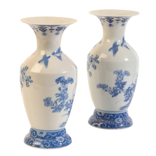 565 - A PAIR OF JAPANESE PORCELAIN BLUE AND WHITE BALUSTER VASES

Meiji period, decorated with birds flyin... 