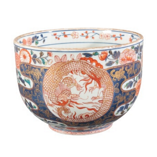 568 - A JAPANESE PORCELAIN JARDINIERE

Edo period, decorated in the Imari palette with a band of flowers t... 