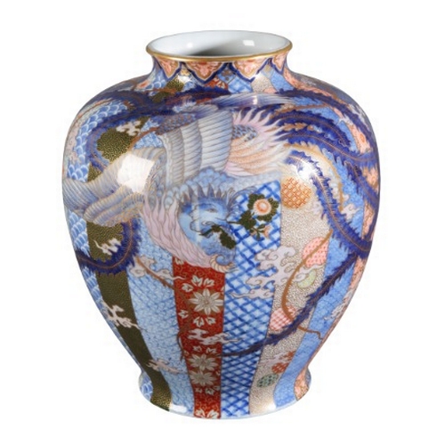 569 - AN IMPRESSIVE JAPANESE PORCELAIN IMARI VASE BY FUKAGAWA

signed to the base, Meiji period, decorated... 