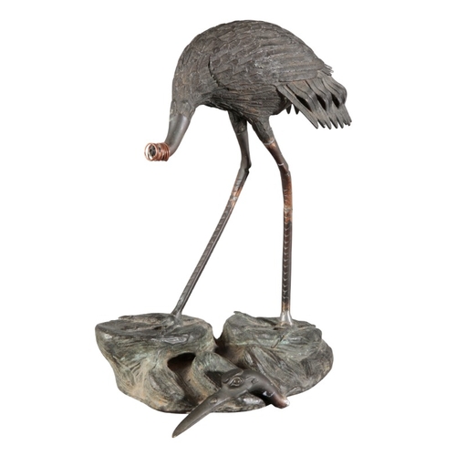 573 - TWO SIMILAR JAPANESE BRONZE CRANES

Meiji period, one figured striding on a naturistically cast base... 