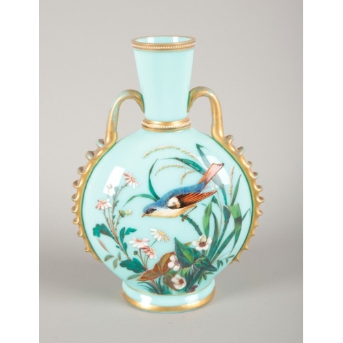 100 - A VICTORIAN TURQUOISE GLASS TWO HANDLED VASE

of Aesthetic design, enamelled with a bird amongst fol... 