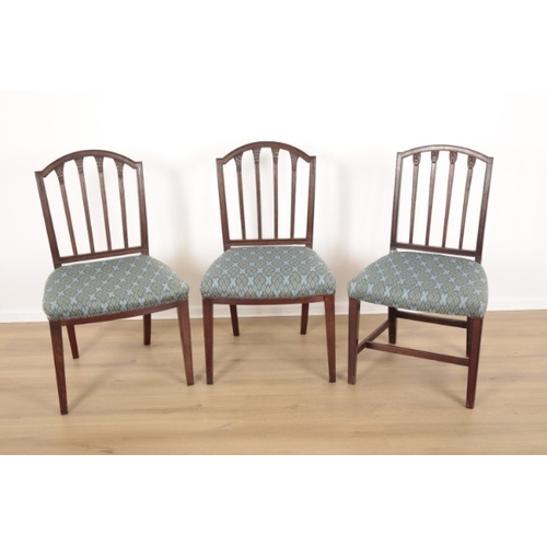 161 - A SET OF SIX 19TH CENTURY MAHOGANY DINING CHAIRS OF SHERATON STYLE

with arched crest rails and leaf... 