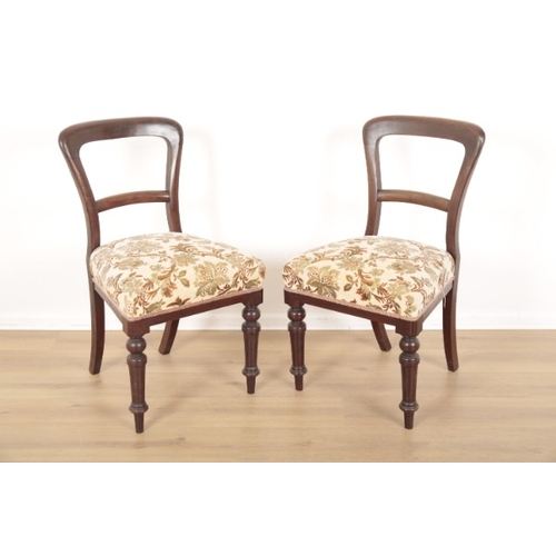 166 - SIX VICTORIAN MAHOGANY BALLOON BACK DINING CHAIRS

upholstered in machined tapestry, of unadorned de... 