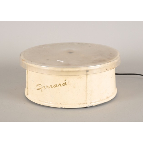 167 - A CREAM PAINTED METAL  JEWELLERY DISPLAY TURNTABLE BY 'GARRARD'

the underside with 'Model GDT3 sche... 