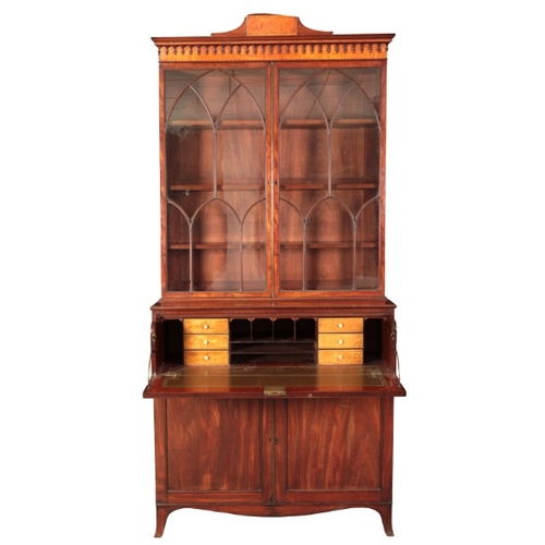 170 - A LATE GEORGE III MAHOGANY SECRETAIRE BOOKCASE

the upper section with a moulded and satinwood bande... 