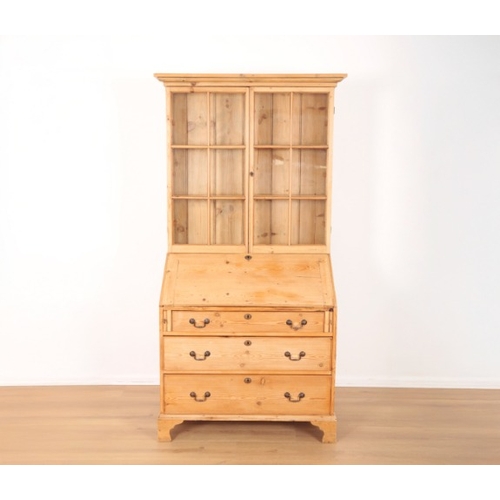 2 - A STRIPPED PINE BUREAU BOOKCASE

19th century, the upper part fitted two shelves enclosed by astraga... 