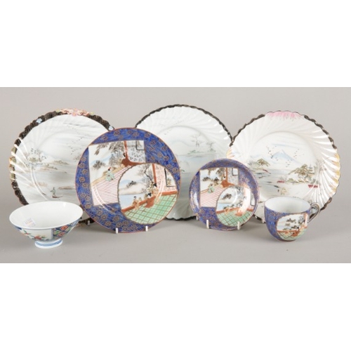 209 - A GROUP OF THREE JAPANESE KUTANI WARE PLATES

Meiji period, marked to the base, with fluted rims and... 