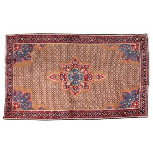 317 - A NORTH WEST PERSIAN BIDJAR CARPET

woven in red and blue with central floral medallion and spandrel... 