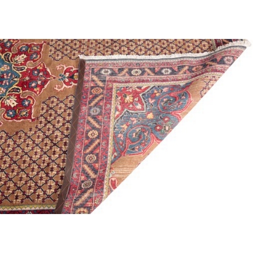 317 - A NORTH WEST PERSIAN BIDJAR CARPET

woven in red and blue with central floral medallion and spandrel... 