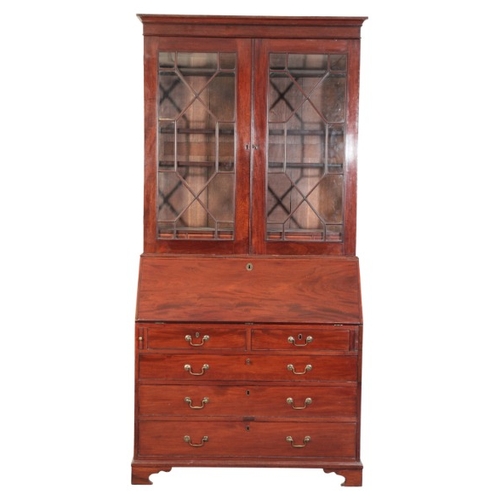 318 - A GEORGE III MAHOGANY BUREAU BOOKCASE

late 18th century, the upper section with a moulded cornice o... 