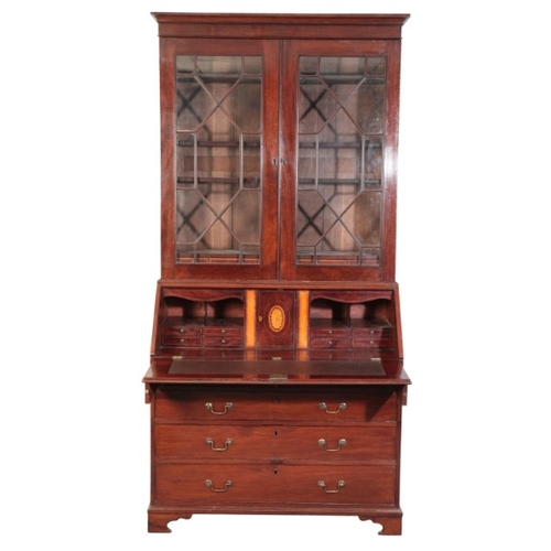 318 - A GEORGE III MAHOGANY BUREAU BOOKCASE

late 18th century, the upper section with a moulded cornice o... 