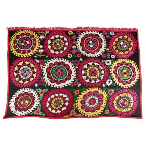 4 - AN UZBEKISTAN SUZANI

woven in pink, white, yellow and green with three alternating rows of four cir... 