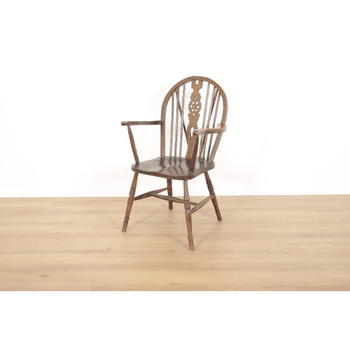 5 - FIVE MATCHED BEECH AND ELM WINDSOR WHEELBACK CHAIRS

19th century and later, including a carver armc... 