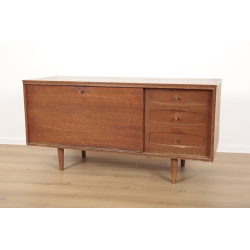 50 - A MID CENTURY WHITE & NEWTON TEAK SIDEBOARD

the fall front enclosing single shelf, flanked by three... 