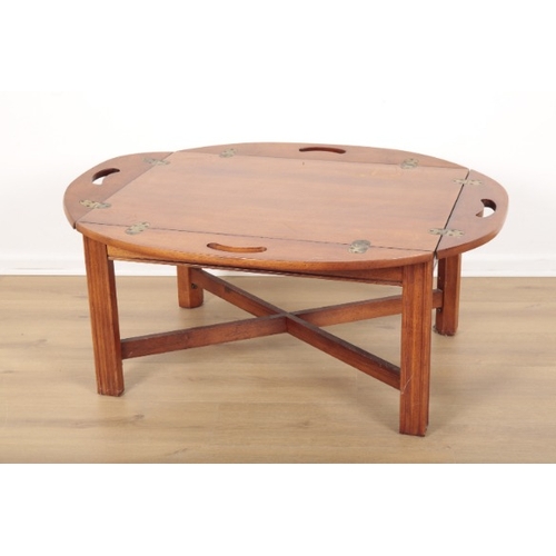 65 - A HARDWOOD 'BUTLER'S TRAY' STYLE COFFEE TABLE

the folding sides with handle cut outs, on square mou... 