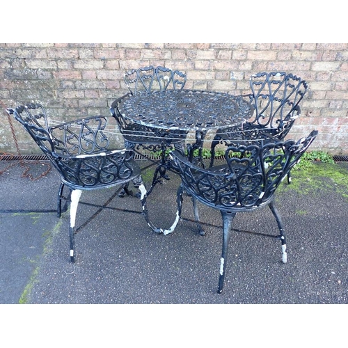 1 - A CAST METAL GARDEN TABLE AND FOUR ARMCHAIRS

Victorian style (for repainting)