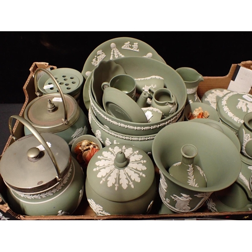 108 - A COLLECTION OF WEDGWOOD GREEN JASPER ORNAMENTS AND TABLEWARES

including biscuit barrels, bowls, di... 